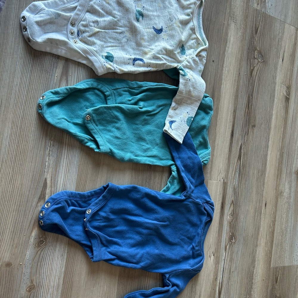 Set of Three Baby Bodysuits in Cream, Teal, and Blue